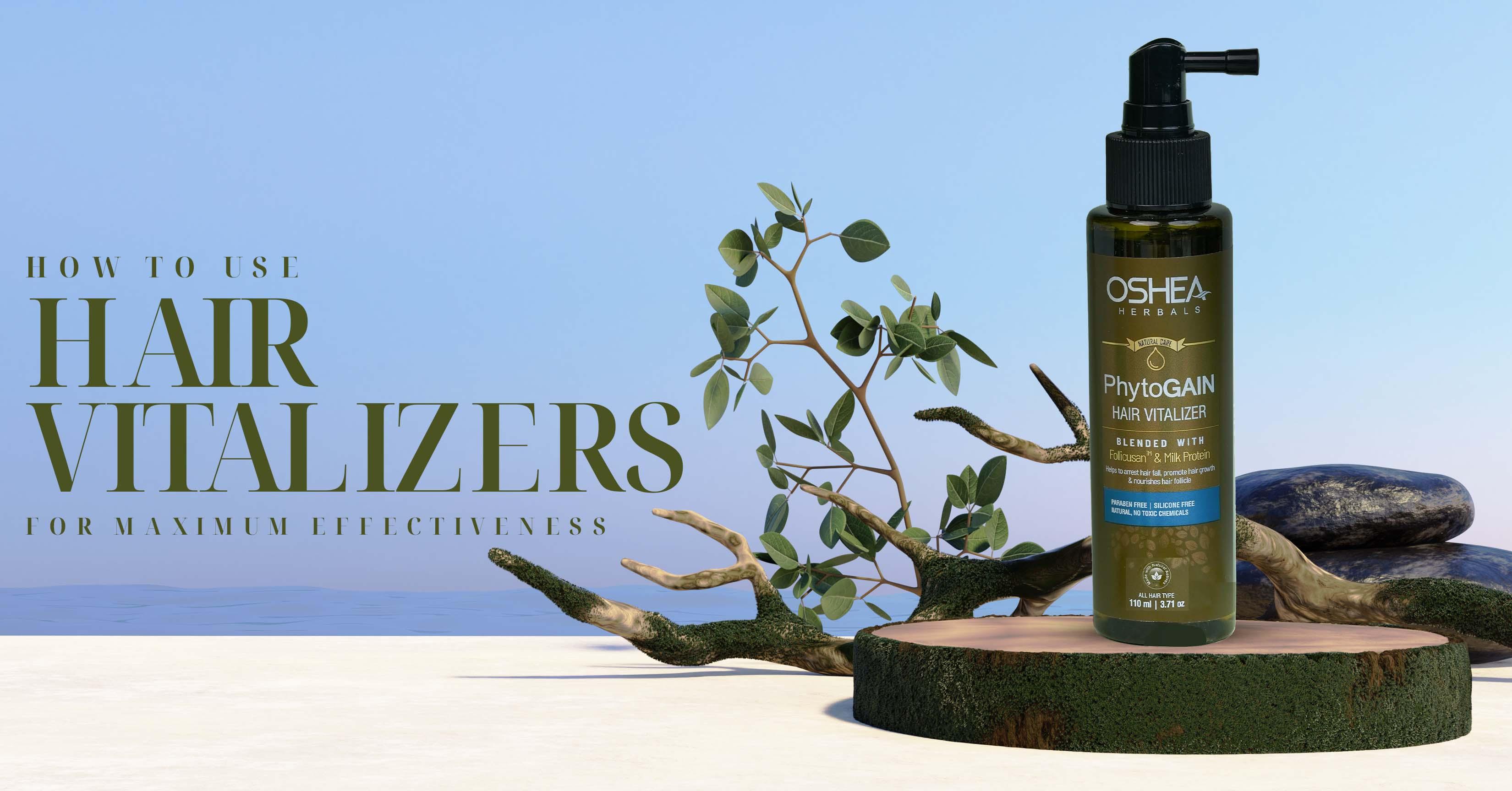 Oshea Herbals Phytogain Hair Vitalizer bottle on a natural background with greenery, showcasing how to use hair vitalizers for maximum effectiveness