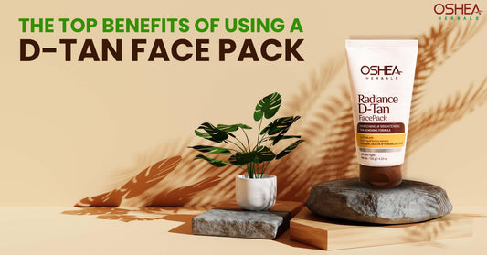 The Top Benefits of Using a D-Tan Face Pack - Oshea Herbals Radiance D-Tan Face Pack on display with plants in the background